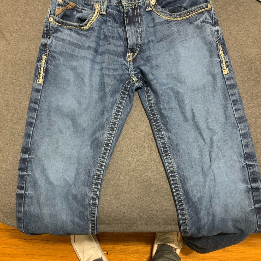 Pair of Ariat jeans. They are too small for me.